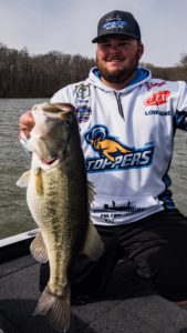 Ty Cox Blue Mountain Fishing Team On His Boat with Trohy Bass Hammer Rods