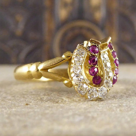 Edwardian horseshoe diamond and ruby ring