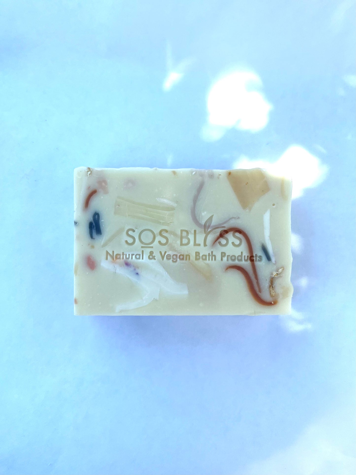 Shreds of all my soap creations in one bar, which is scented with essential oils.
