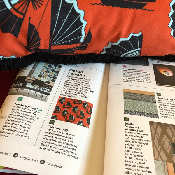 ohh fleur at 100% design kensington olympia designer wallpaper and fabrics  Fan of Junk in red getting some press in the show guide