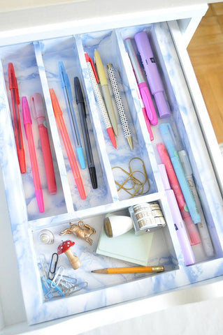DIY Marbled Organizer Tutorial from Design Sponge on the Laura James Jewelry Blog!