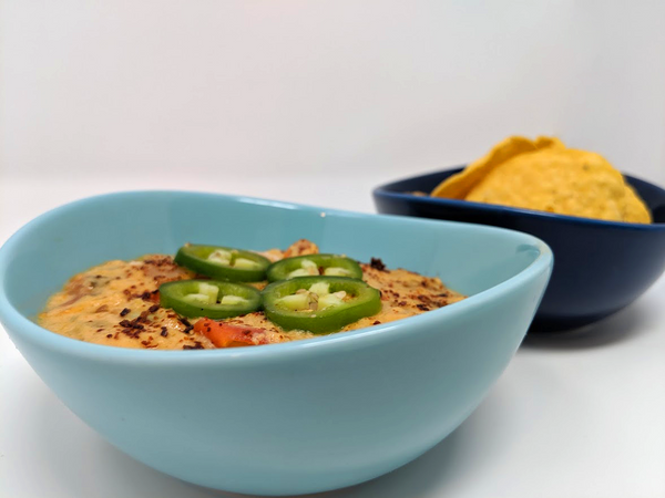 Completed Queso Dip With Jalapenos and Tortilla Chips
