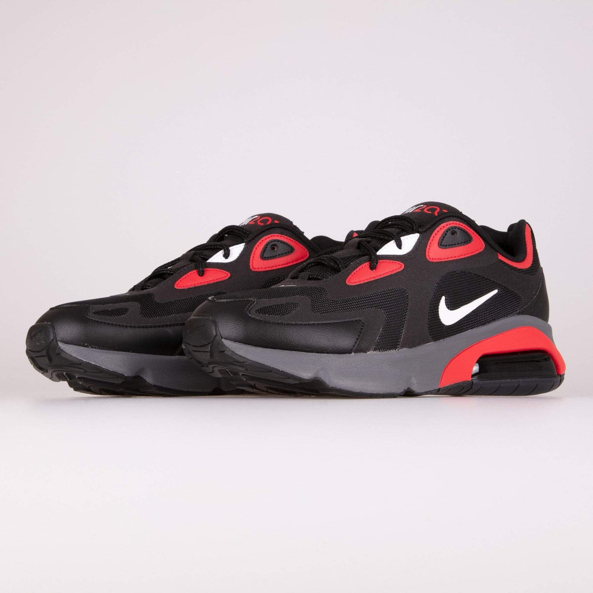 black and red nike trainers