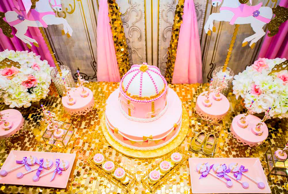 Princess carousel baby shower with pink, lavender, and gold sequins