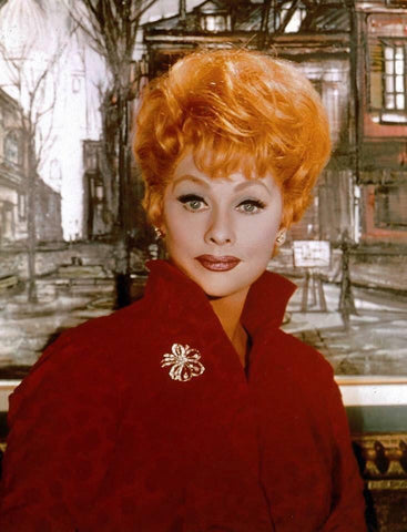Lucille Ball wearing a brooch on her jacket