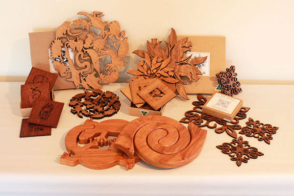 Photos of different wooden coasters and trivets