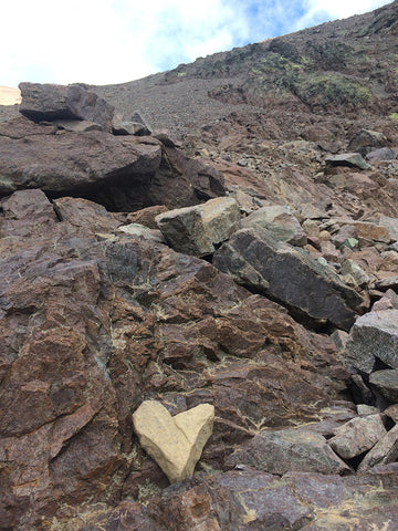 Heart-shaped rock on the mountain