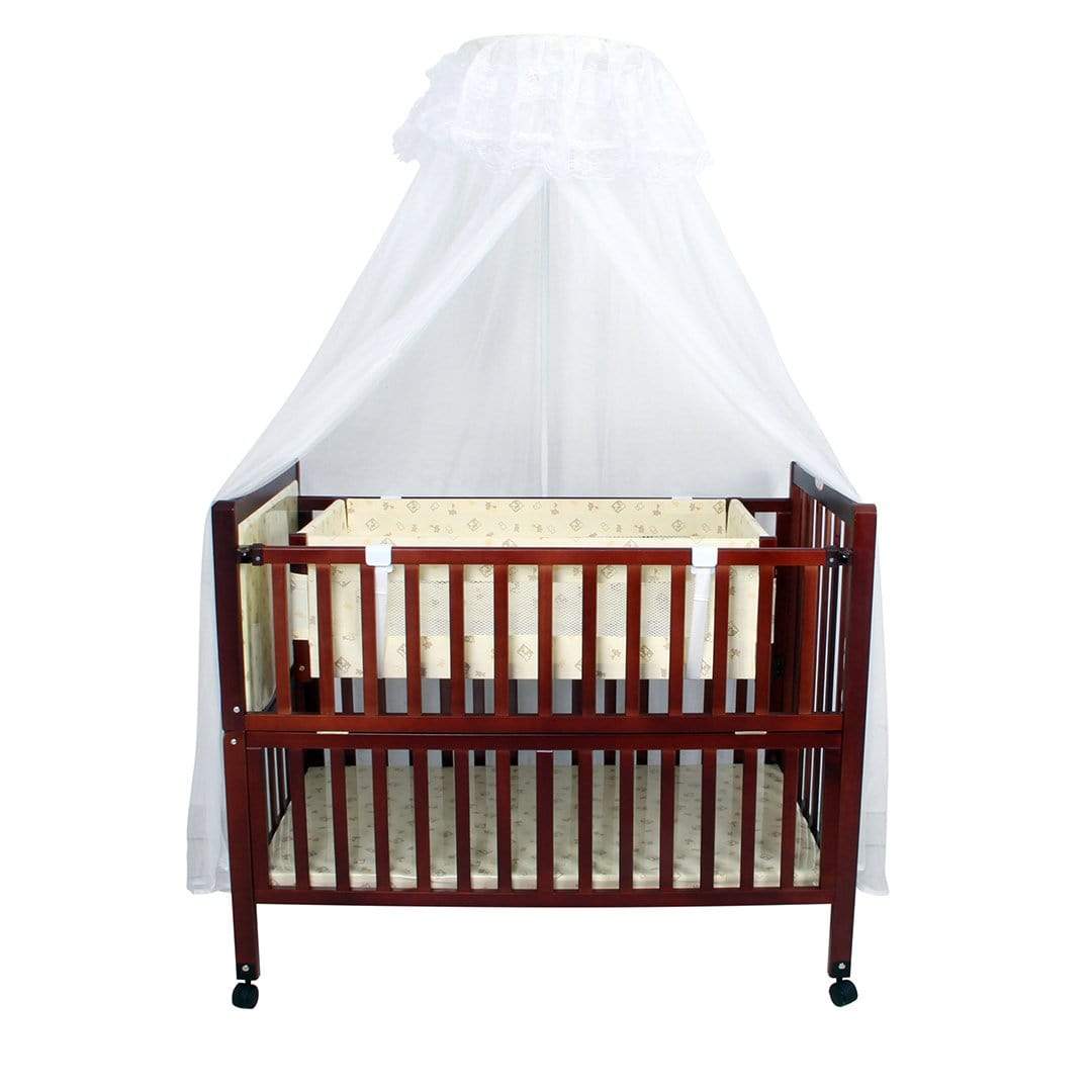 wooden cradle with mosquito net