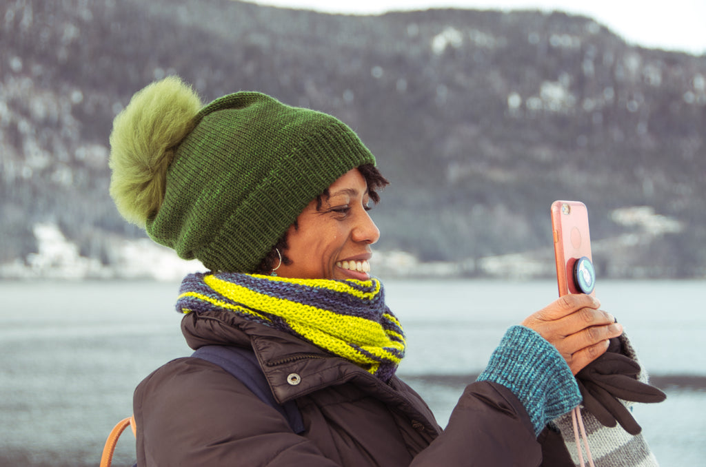 Jimi taking photos by the Fjord