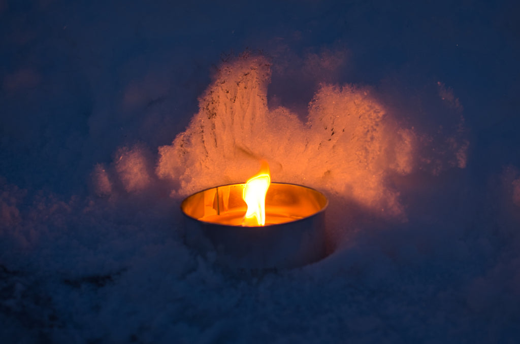 Candle in the snow