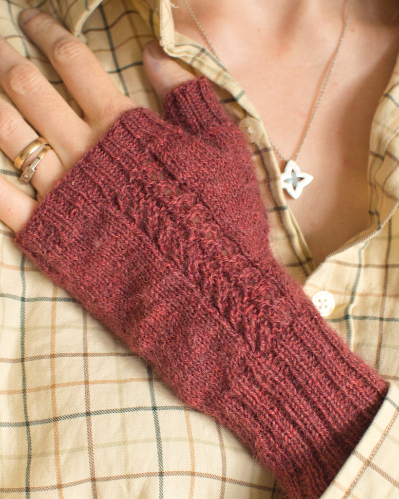 Wynsum fingerless mitts knit in Caia Baby Alpaca in Pandora – dark red yarn