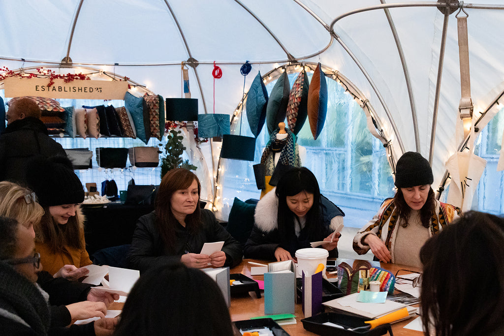 Kate Rochester of Hanbury Press leads a workshop on bookbinding.