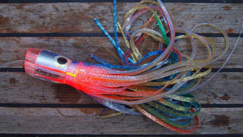 Deepsea skirted trolling lure with led light.