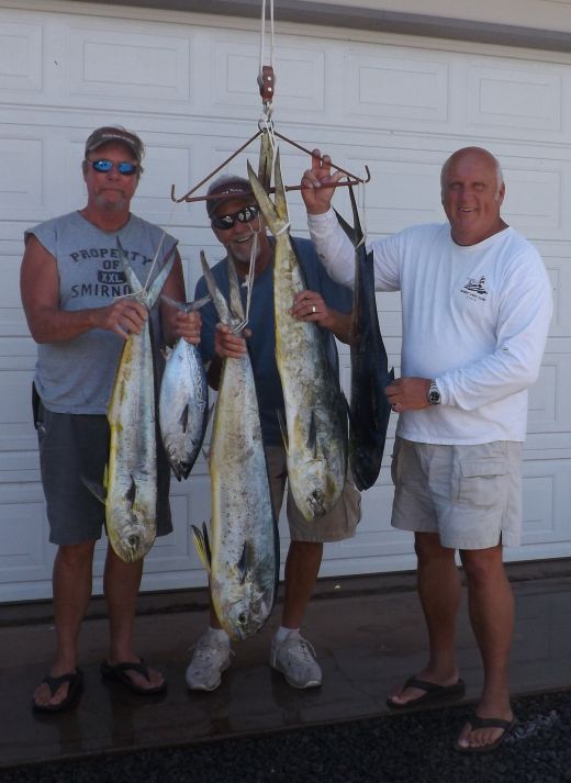 Bruce Lockwood and Molokai Fishing Team with four Mahi-Mahi.