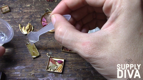 Adding resin to a jewelry bezel