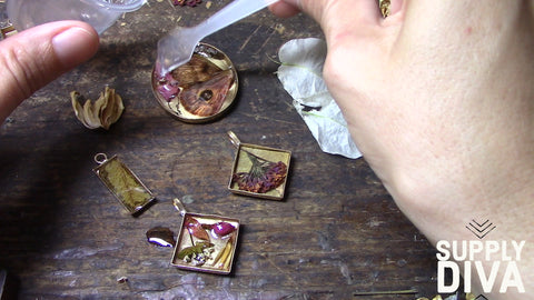 Dripping resin into a bezel pendant