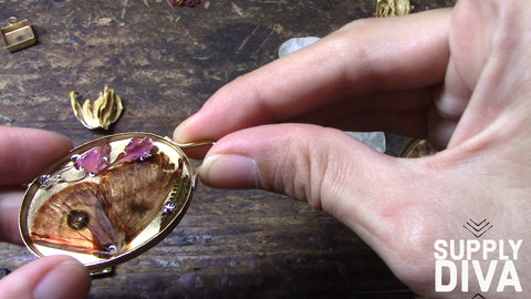 Butterfly in resin for a bezel pendant