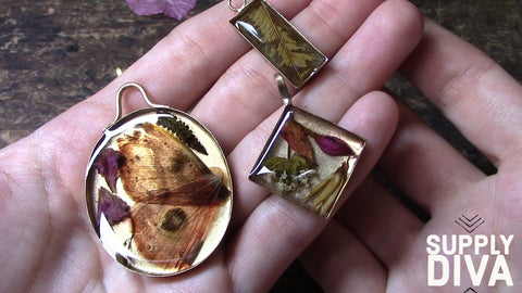 Flowers and leaves set in a bezel setting with resin