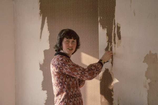 Old fashioned wallpaper hanging 