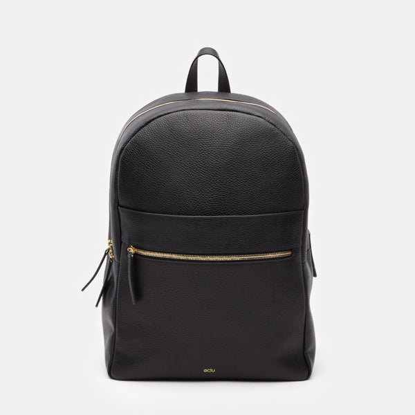 black backpack with gold zippers