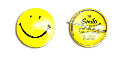 Smiley pin for insurance company by Harvey Ball