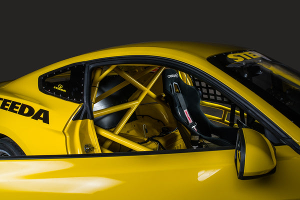 Steeda Q500R interior with roll cage and Corbeau race seats