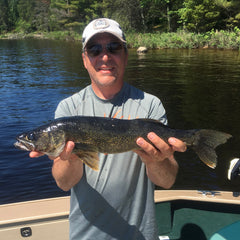 Man holder Rainy Lake walleye - Voyageurs National Park