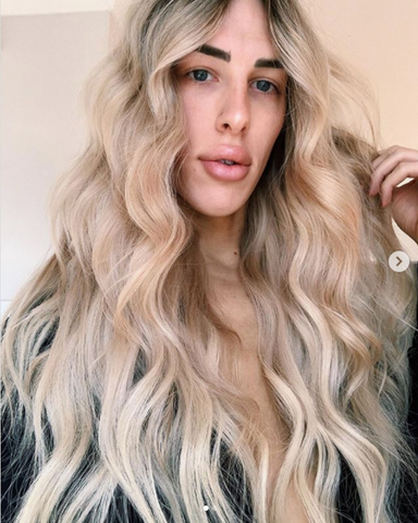 Person with blonde waves