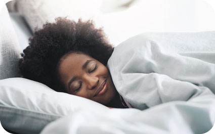 Image of woman sleeping peacefully with the help of CBD