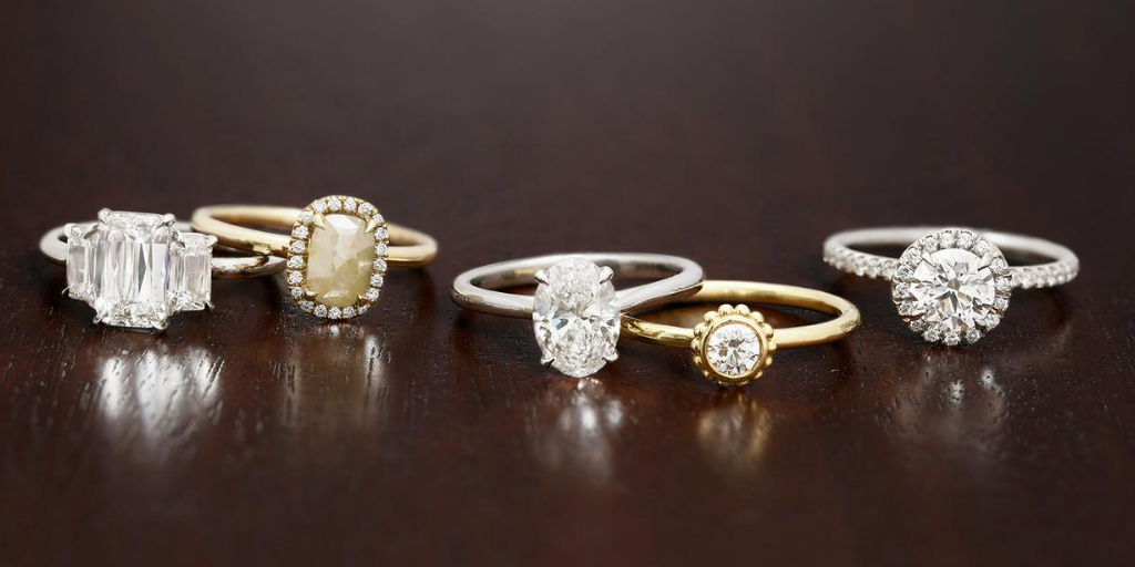 Assorted Engagement Ring Styles on Wood