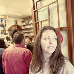 Brenna Waiting for a Table at Taberna Santo Antonio