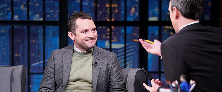 Still image of Elijah Wood wearing a Brooklyn Tailors suit on Seth Myers.