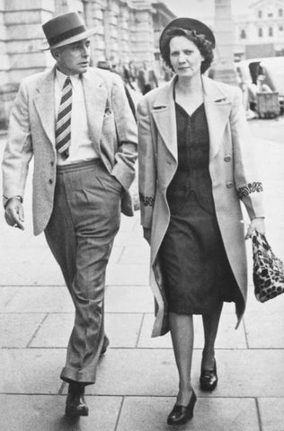 Edith and her husband walking down the street post WW2