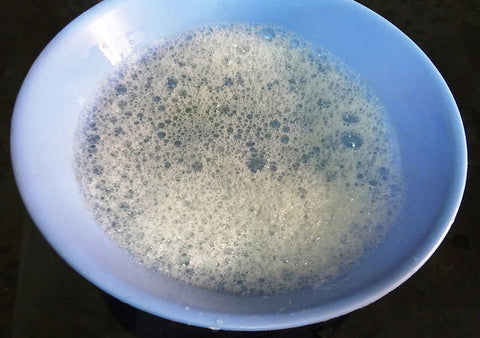 dish soap with water in a bowl