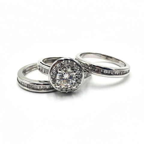 halo engagement ring with baguette wedding bands