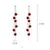 Boucles d'oreilles cascade de roses et strass