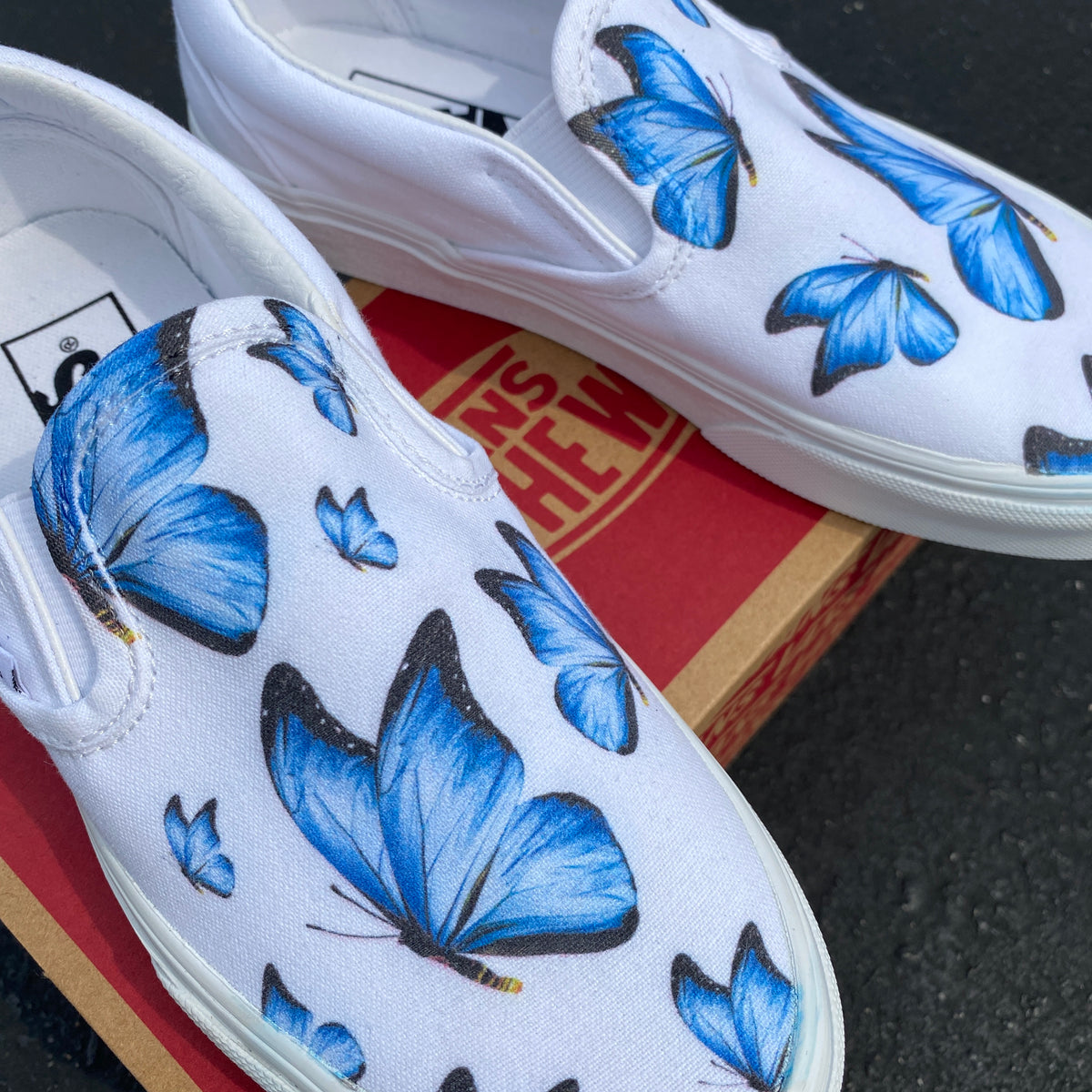 white vans with butterflies
