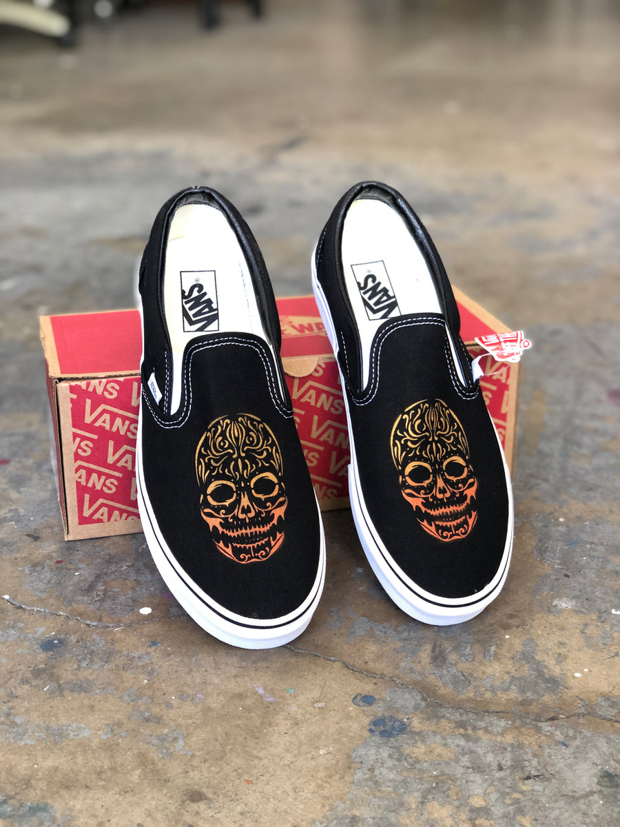 vans sugar skull slip ons