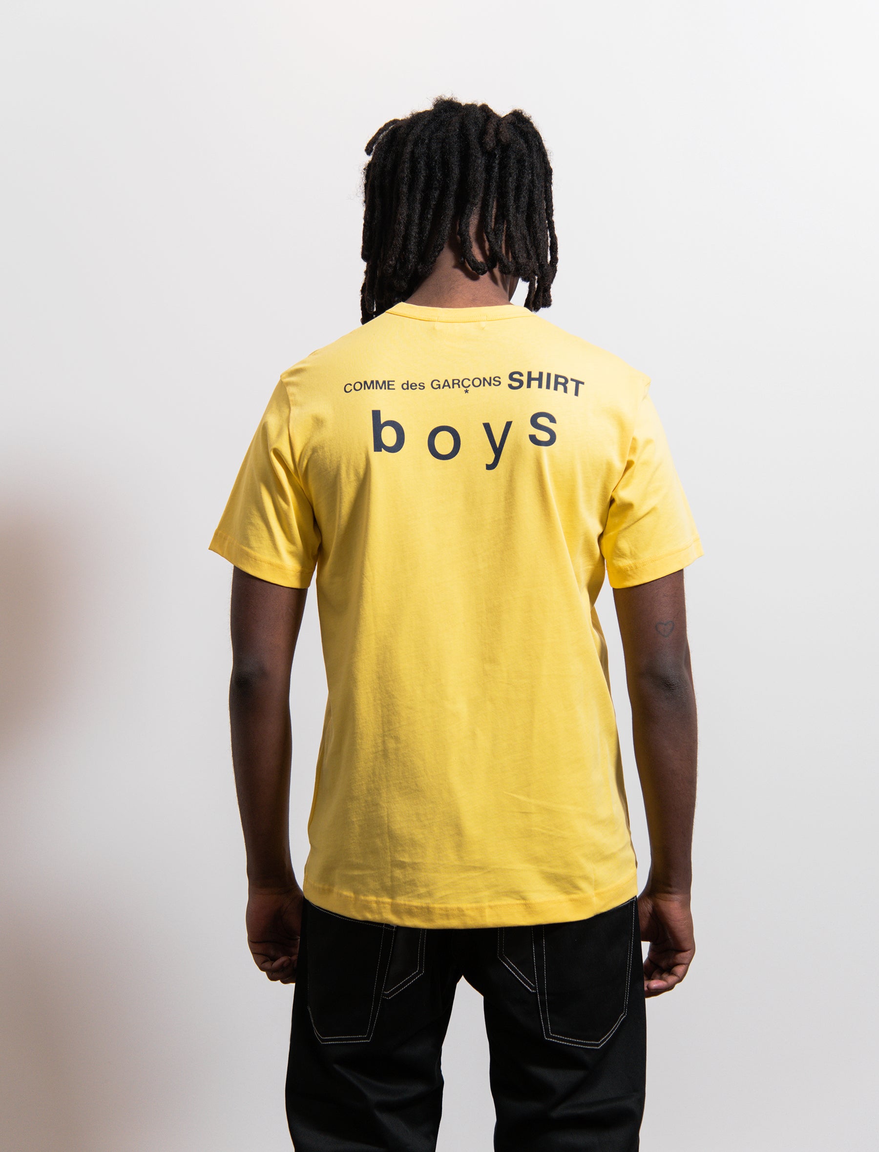 yellow cdg t shirt