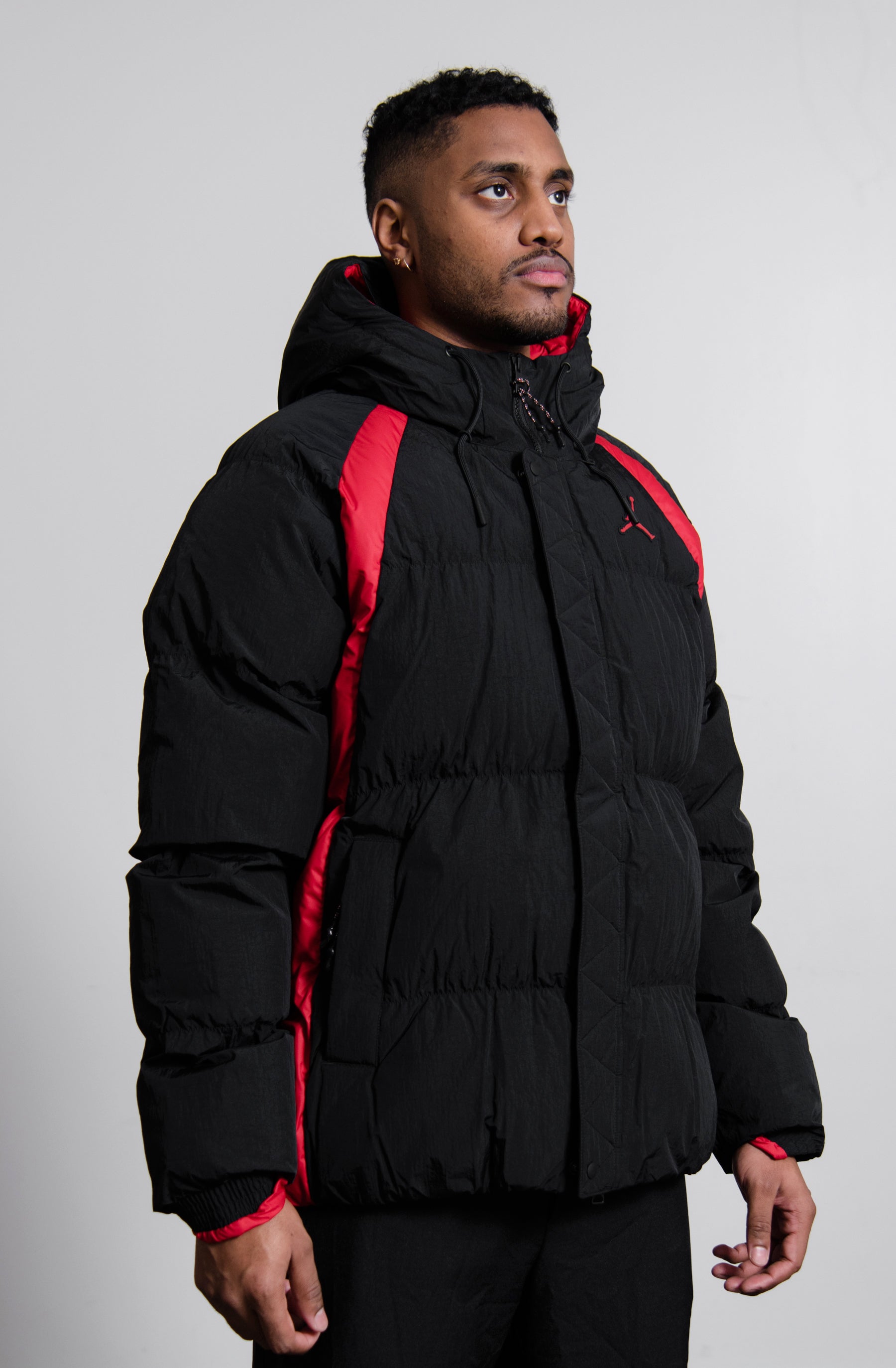 black and red north face puffer jacket