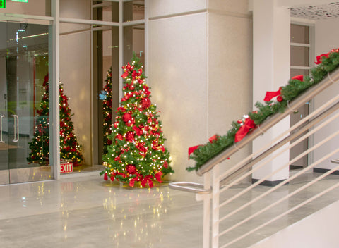 commercial property building office park lighting holiday christmas decoration installations outdoor indoor interior garland trees wreaths lighting ball ornaments