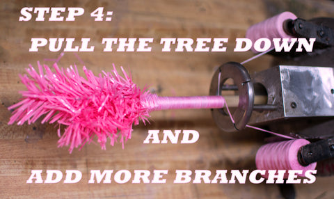 Step 4 of How to Make a Pink Christmas Tree from Lee Display using our proprietary custom built branching machines.