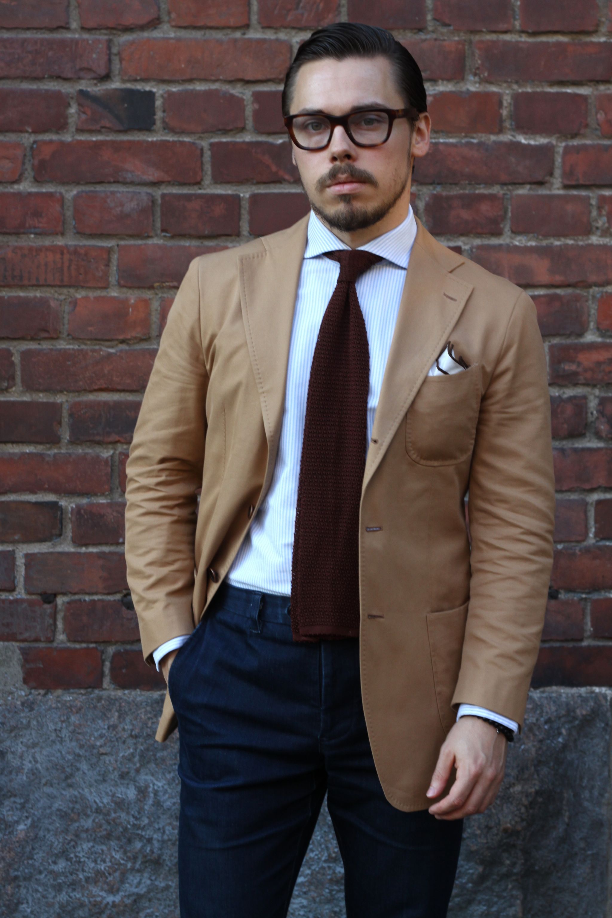 Camel color suitjacket with denim slacks