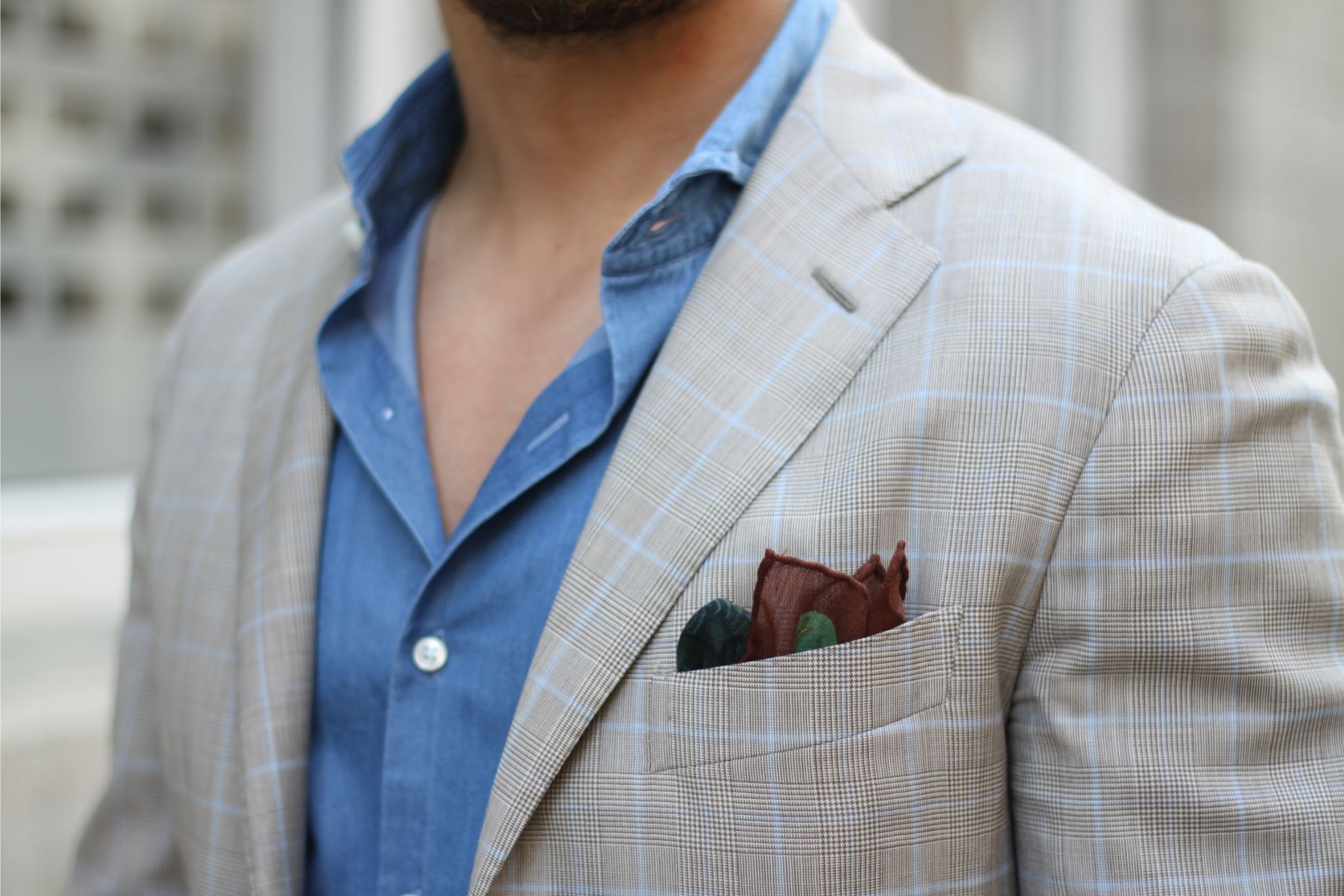 Checked sport coat with denim shirt and wool silk pocket square