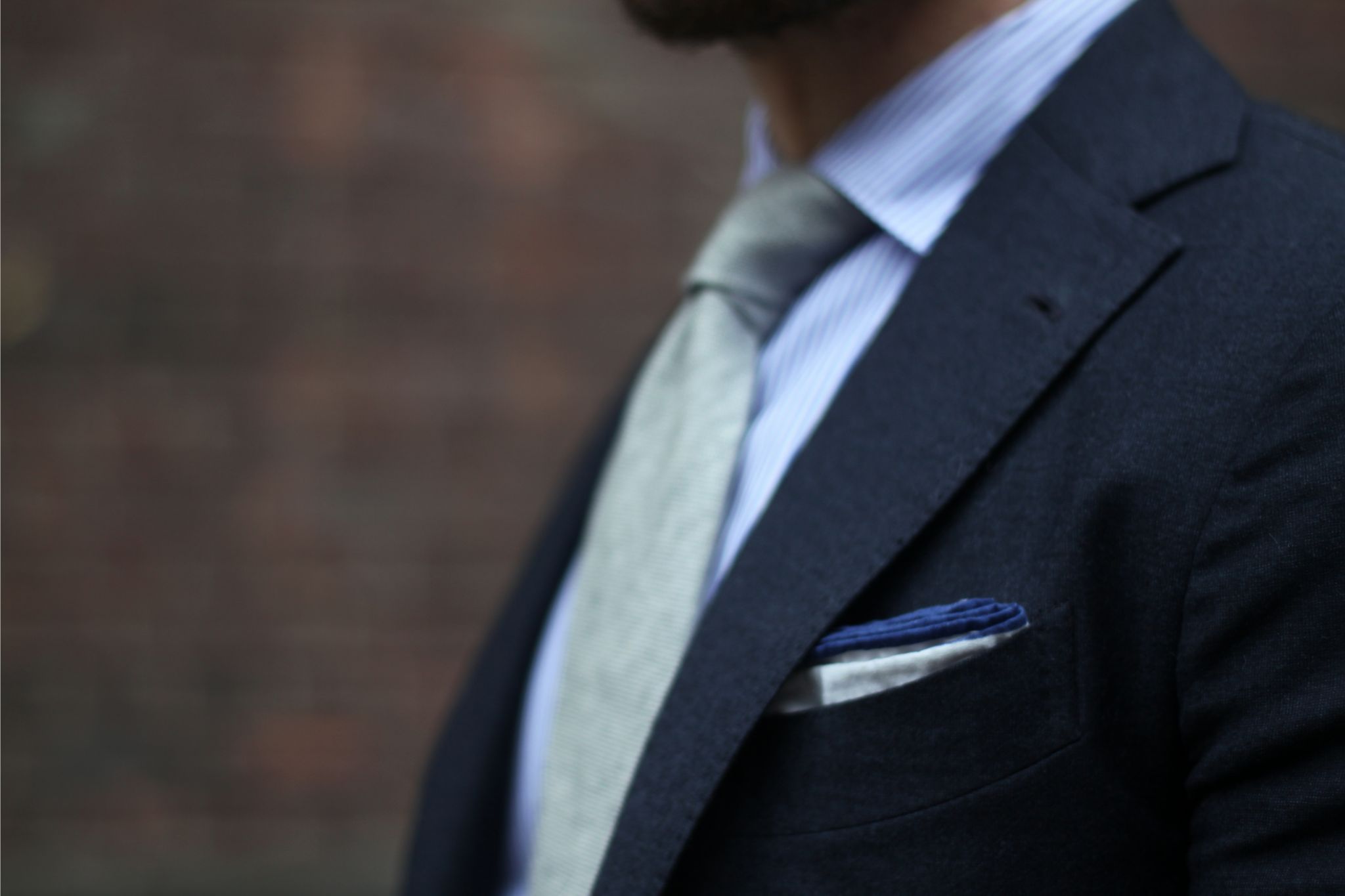 Gray suit with gray tie - white cotton pocket square with blue borders