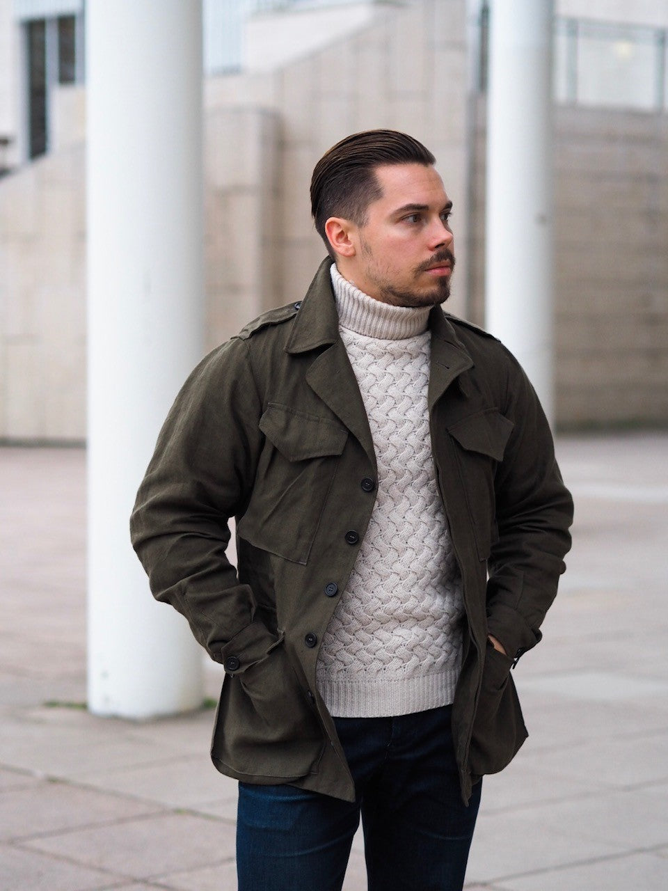 Army green field jacket with knitwear and denim