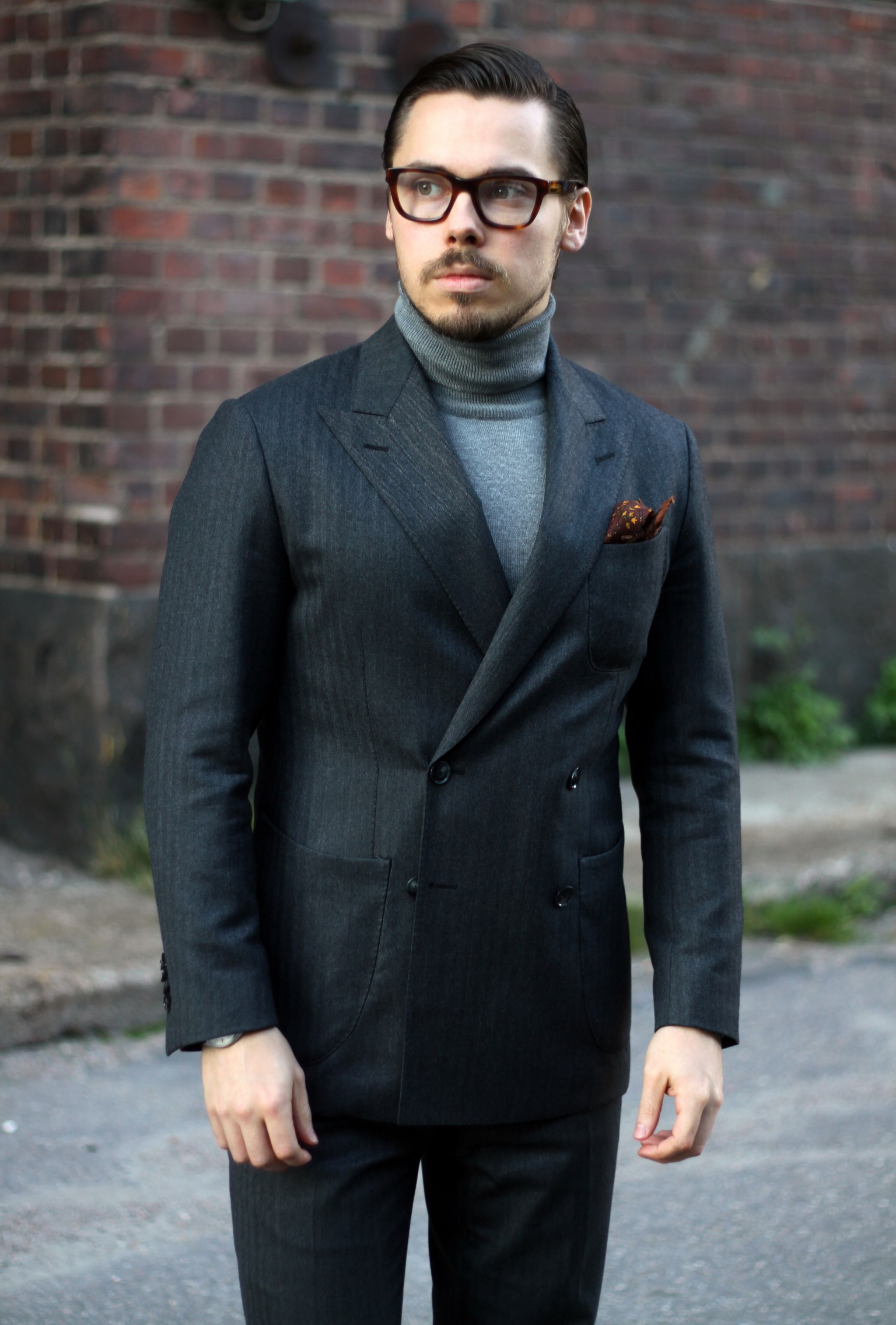 Gray double-breasted suit with roll neck sweater