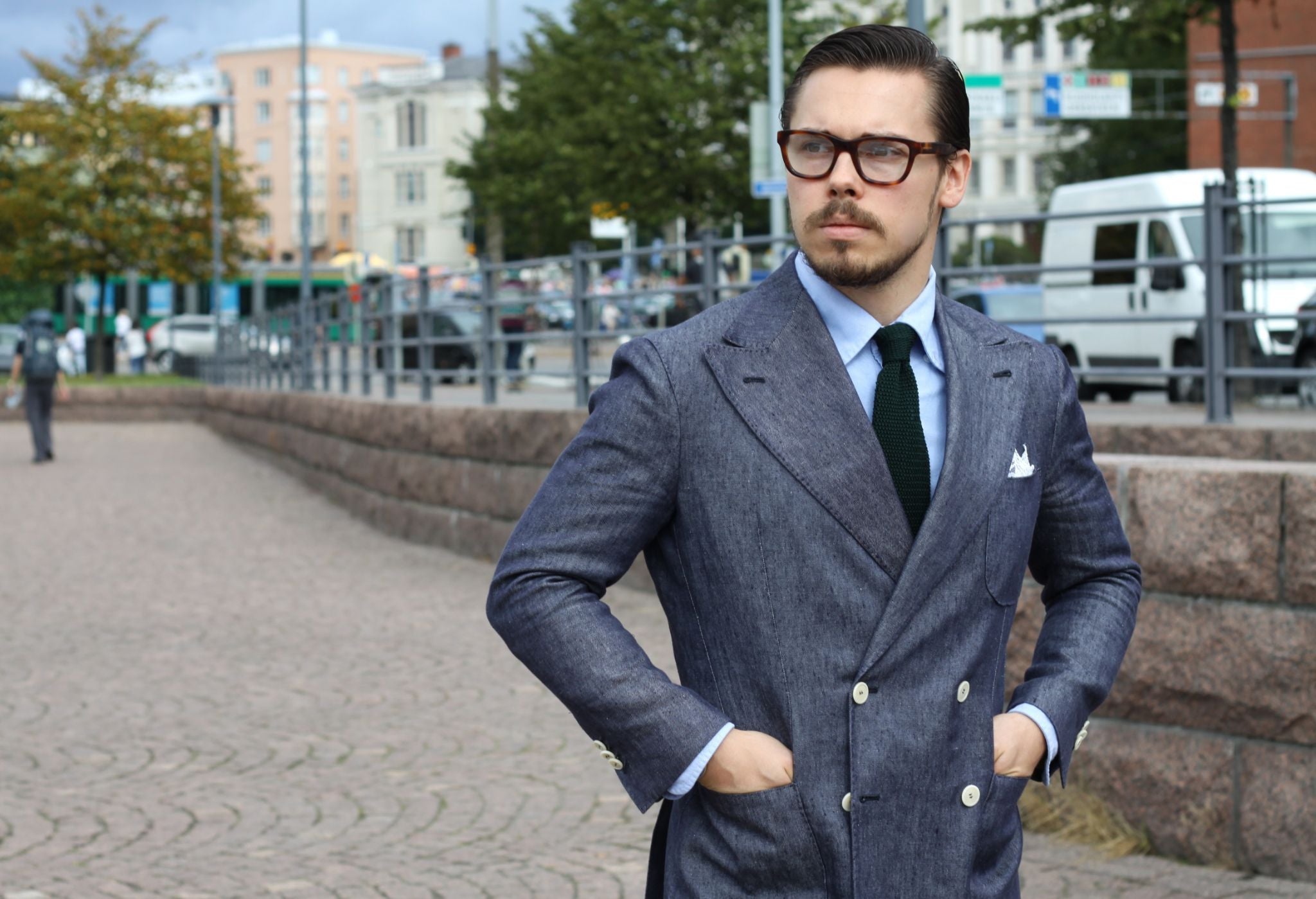 Double-breasted blazer with cotton trousers and knitted tie