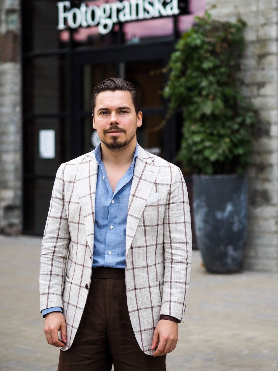 Made-to-measure Windowpane suit jacket with tobacco linen trousers and chambray shirt