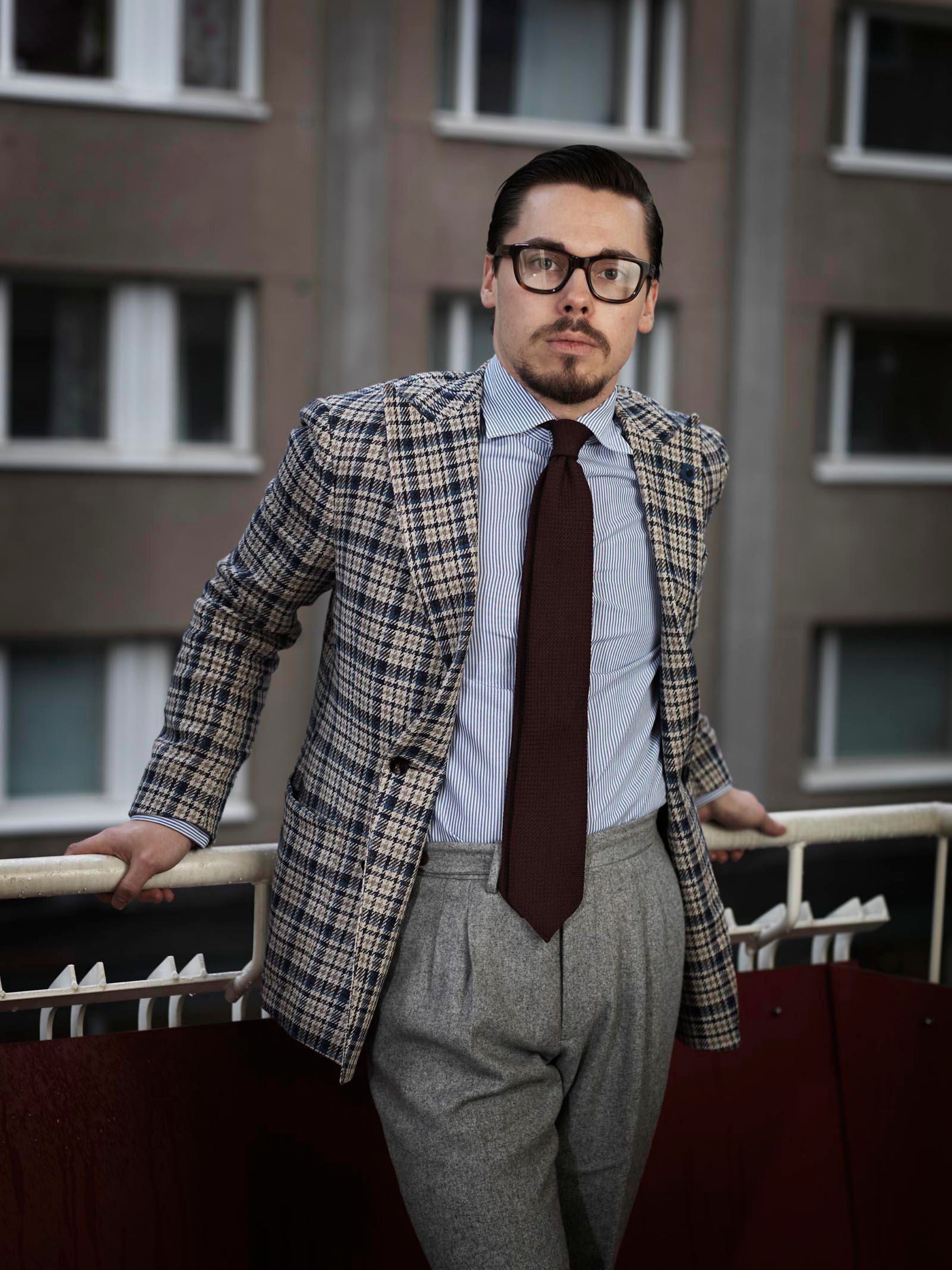 sport coat with gray flannel trousers
